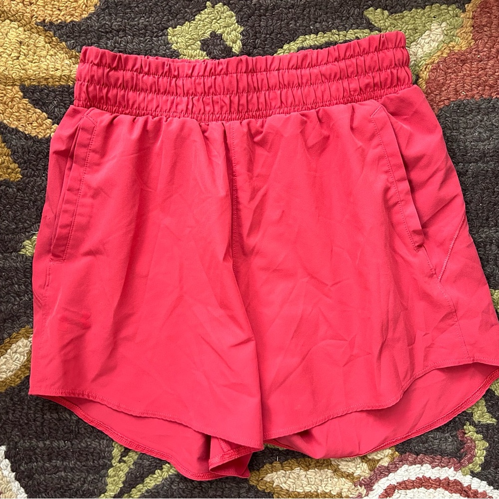 Under Armour Women's Bright Salmon Athletic Shorts